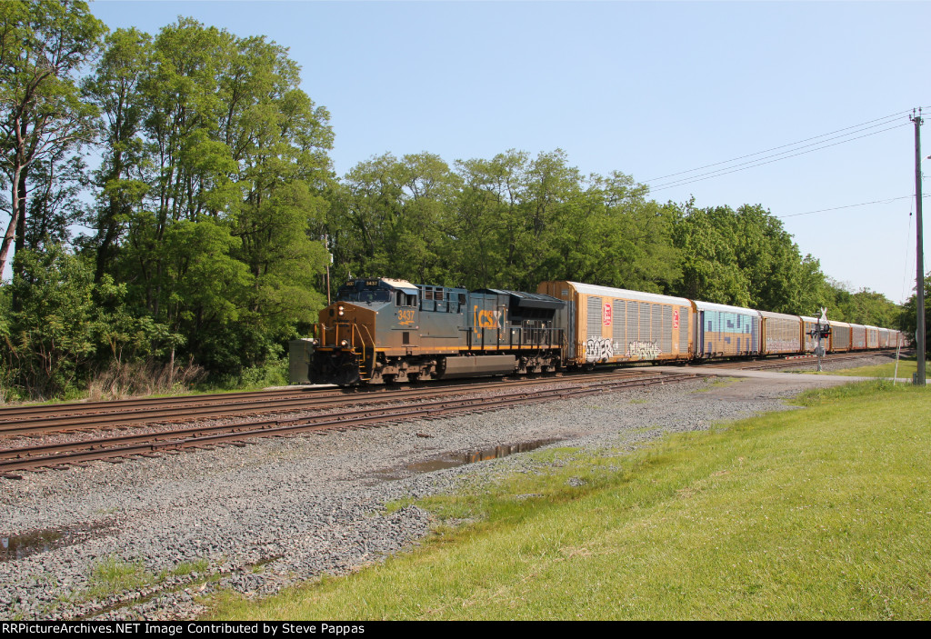 CSX 3437 takes a train west